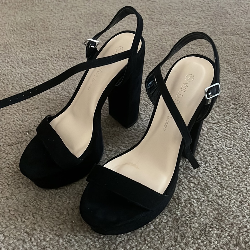 WILD DIVA black platform heels.